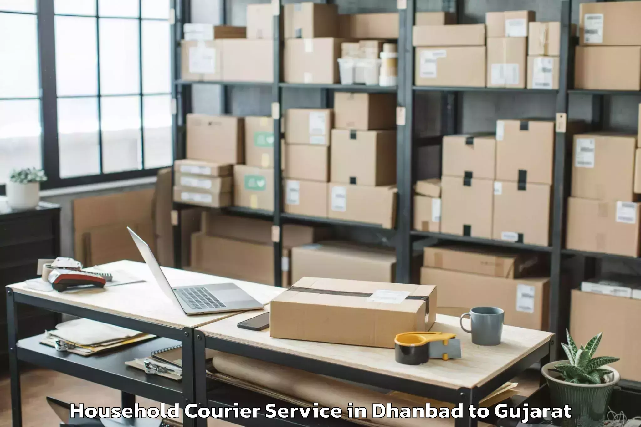 Book Your Dhanbad to Gujarat National Law Universit Household Courier Today